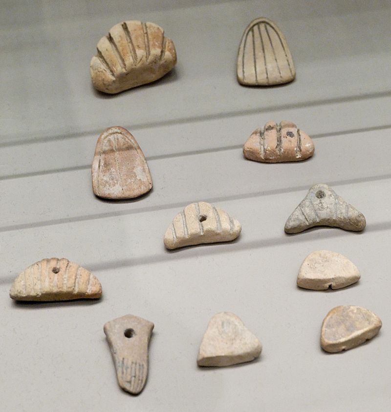 Clay tokens, from Susa, Uruk period, circa 3500 BC. Department of Oriental Antiquities, Louvre